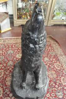 Heres a special one of a kind item. This Wolf sculpture is made of 