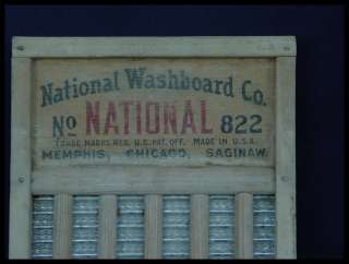 Neat Old metal and Wood Washboard with Graphics, measures 23 1/8 x 11 