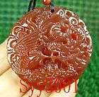 Rare red jade carved dragon phoenix amul