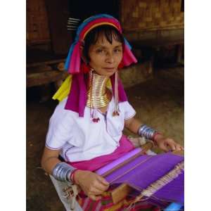 Portrait of a Long Necked Padaung Tribe Woman Weaving on a Hand Held 