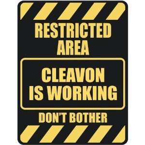   RESTRICTED AREA CLEAVON IS WORKING  PARKING SIGN