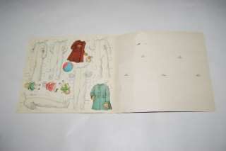   Dolls and Costumes Cut Outs. This book of paper dolls is complete and