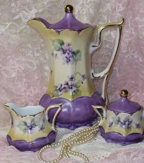 Gorgeous Porcelain Chocolate/Coffee Set with Hand Painted Violets