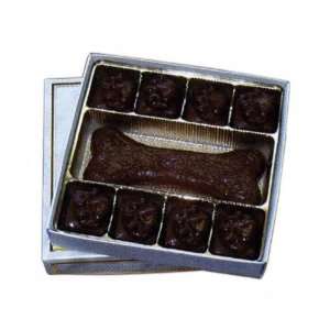 Molded dog bone and paw pads shapes chocolate in gift box.  