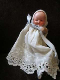 Incredible miniature bisque baby boy doll in antique Christening gown 