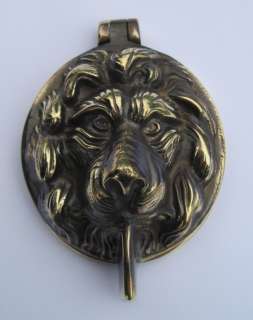   furniture,lions head door knocker,brass door knocker,lions head
