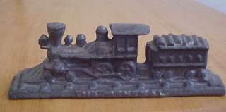 Lead Metal Toy of Train on Railroad Track  