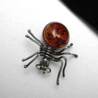 This is a great creepy crawlie spider pin with a lovely round piece of 